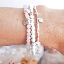 Load image into Gallery viewer, ADORE Rose quartz crystal 925 sterling silver beaded bracelet worn on wrist with howlite beacelet
